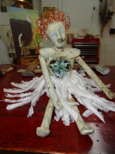 Rebecca is an angel, but this isn't her. It's the one she formed.